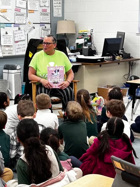 teacher reading to class